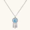 Sterling silver dreamcatcher pendant with blue moissanite center and three feather charms on adjustable chain.