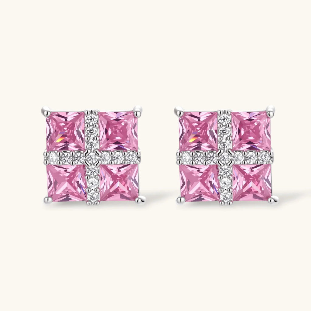 White gold plated jewelry set with pink cubic zirconia stones in geometric cross design, featuring Y-necklace and square stud earrings