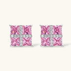 White gold plated jewelry set with pink cubic zirconia stones in geometric cross design, featuring Y-necklace and square stud earrings